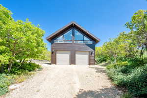 Garage featuring driveway