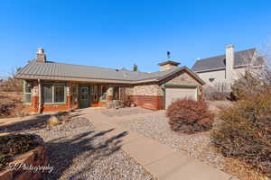 Ranch-style home with a garage