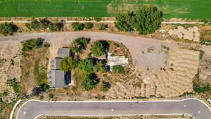 Birds eye view of property featuring a rural view