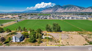 Birds eye view of property with a mountain view