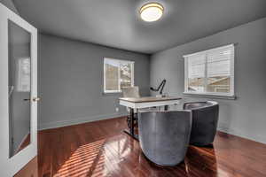 Formal dining converted to a stylish office with French Doors