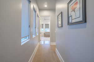 Corridor featuring light hardwood / wood-style flooring