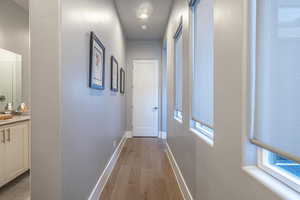 Corridor featuring light hardwood / wood-style floors