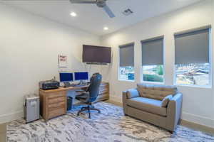 Office area with ceiling fan