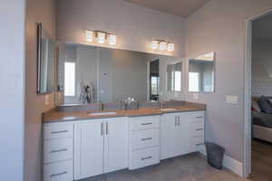 Bathroom with vanity and a healthy amount of sunlight