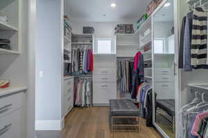 Walk in closet featuring light wood-type flooring