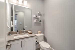 Bathroom with vanity and toilet