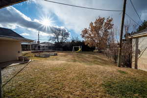 View of yard with a playground