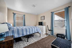 View of carpeted bedroom