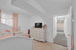 Bedroom featuring light tile patterned floors