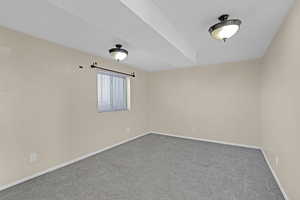 View of carpeted spare room