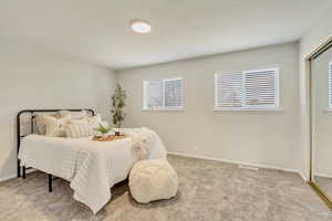 View of carpeted bedroom