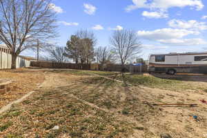 View of large yard with RV parking