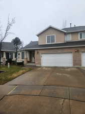 View of front of house with a garage