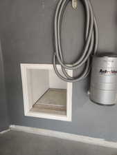 Central Vac System & entrance to Crawl space for more Storage