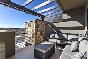 View of patio / terrace with an outdoor hangout area and a pergola