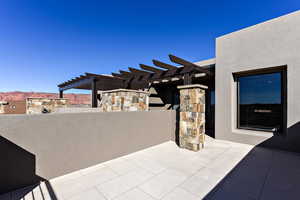 View of patio featuring a mountain view and a pergola