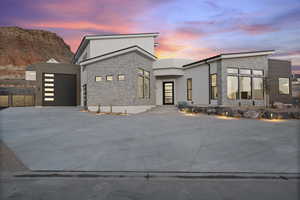 Contemporary home featuring a garage