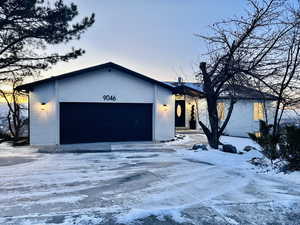 View of front of home featuring a garage