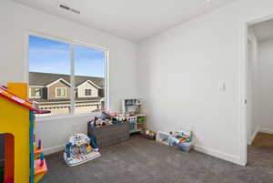 Recreation room featuring carpet flooring