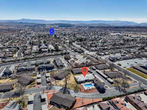 Birds eye view of property featuring a mountain view