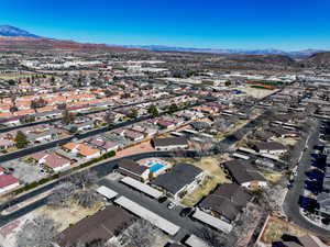 Birds eye view of property with a mountain view