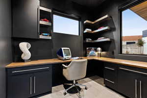 Office featuring a healthy amount of sunlight and built in study area