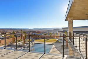 Balcony with a residential view and a mountain view