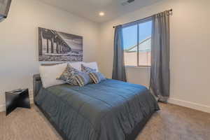 View of carpeted bedroom