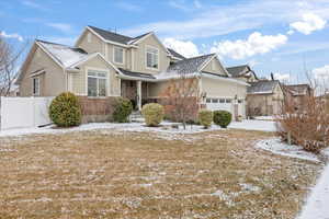 Front of property with a garage