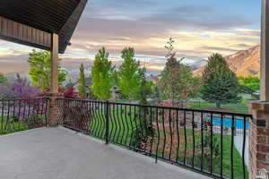 Balcony at dusk with a mountain view