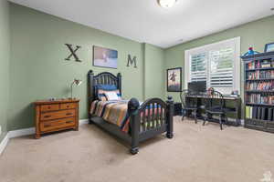 View of carpeted bedroom