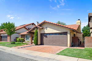 View of front of property featuring a front lawn