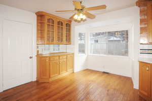 Kitchen featuring light hardwood / wood-style flooring and ceiling fan