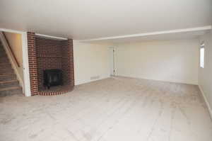 Unfurnished living room with carpet