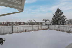 View of yard layered in snow