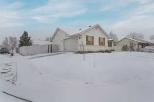 View of front of property featuring a garage