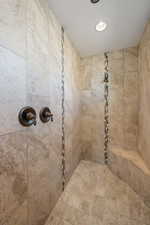 Bathroom with tiled shower