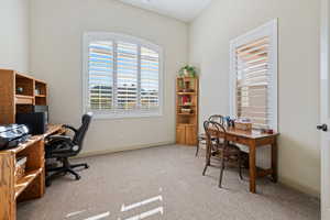 Office with light colored carpet