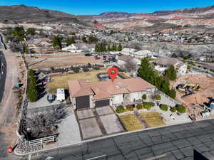 Birds eye view of property with a mountain view