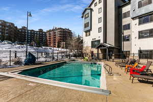 Spacious pool and social area with BBQ