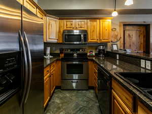 Kitchen featuring granite countertops,  stainless steel appliances