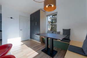 Office space featuring light wood-type flooring