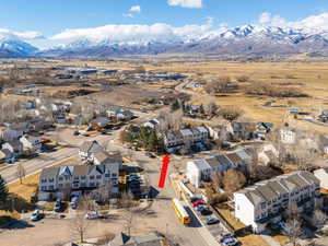 Birds eye view of property featuring a mountain view