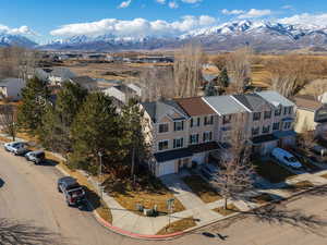 Birds eye view of property with a mountain view