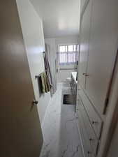 Bathroom with vanity, a shower with shower curtain, and toilet