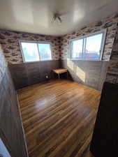 Empty room featuring hardwood / wood-style floors