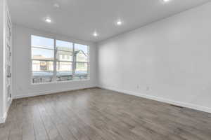 Unfurnished room with wood-type flooring