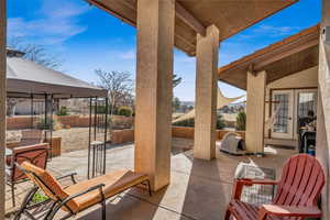 View of patio featuring a gazebo