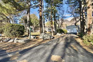 View of front of home featuring a garage and a mountain view